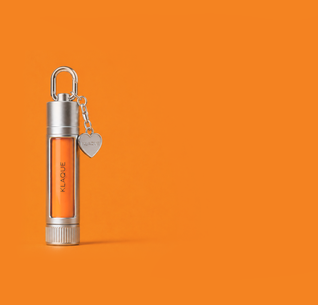 KLAQUE LIP LOCK in Signature Orange with an aluminum metal case